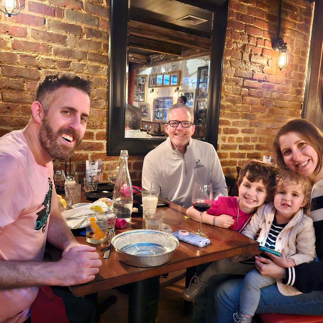 Ideal Practices team dinner with client and family